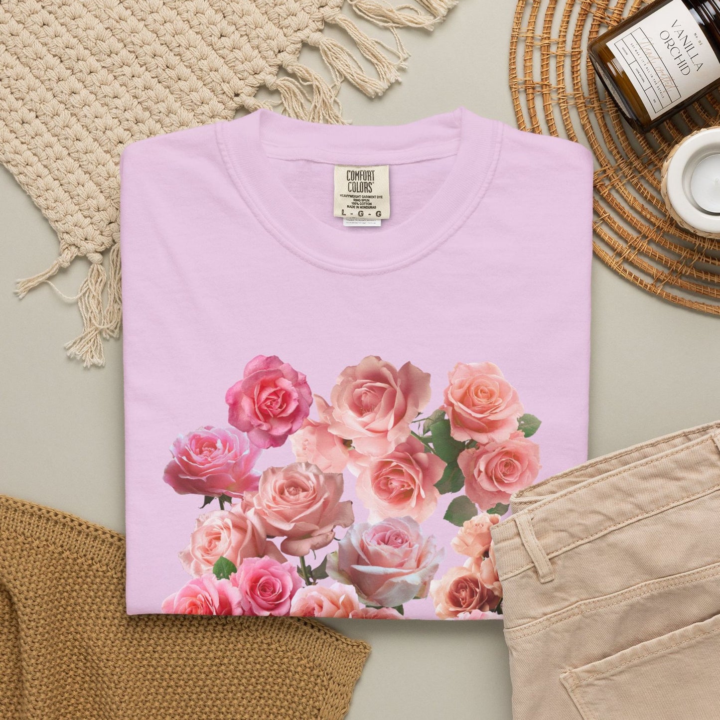 Woman wearing an Orchid Rose floral June birthday gift shirt –Whimsical style -Crossroads Dandelion