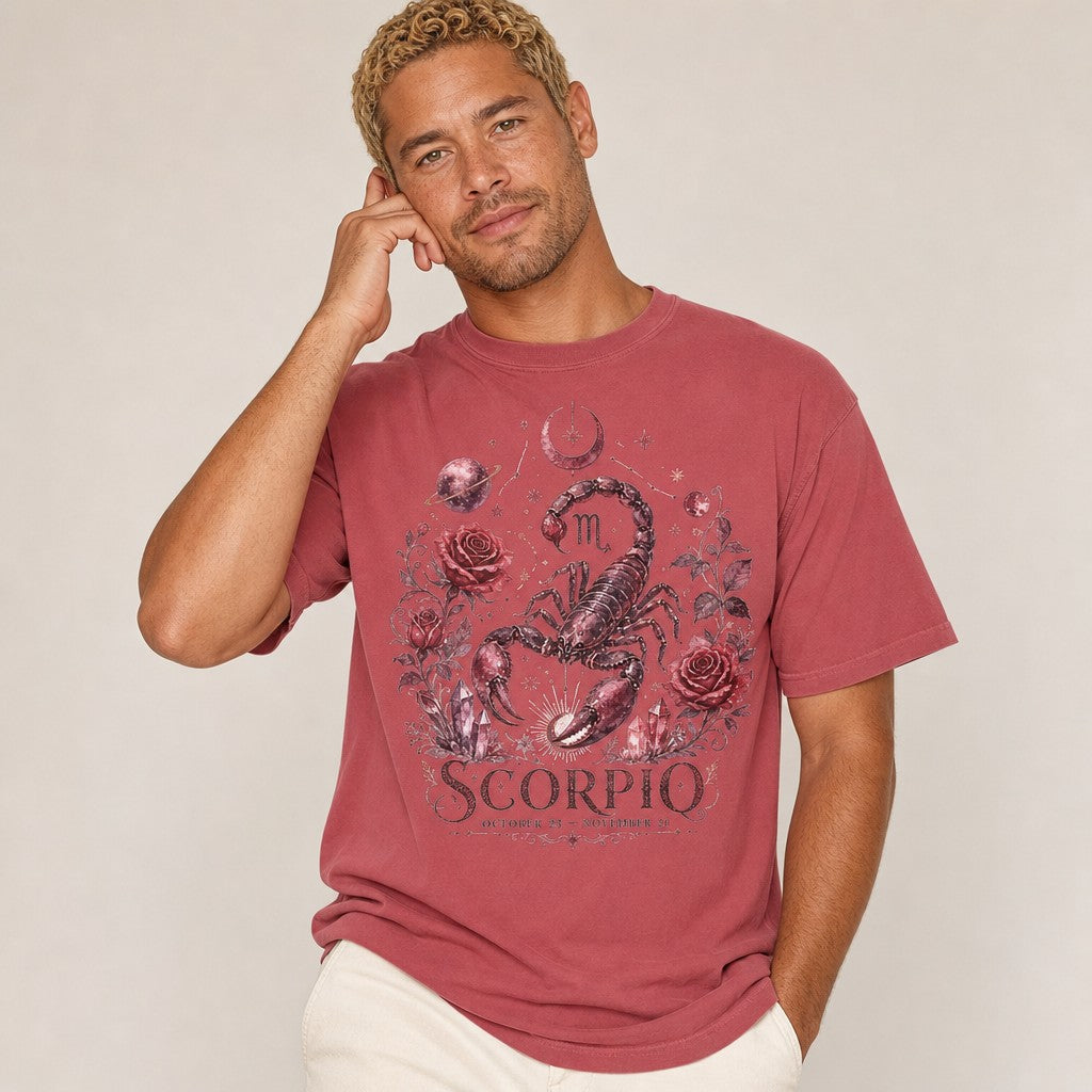 Man wearing a crimson Comfort Colors 1717 t-shirt featuring a vintage celestial Scorpio design with a hand-drawn scorpion, dark red roses, stars, crescent moon, and crystals, perfect for astrology lovers and magical vibes, by Crossroads Dandelion
