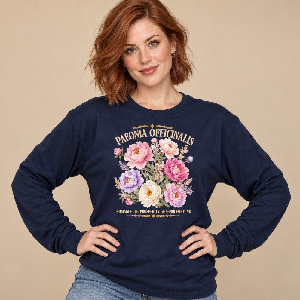 Woman in navy Bella Canvas 3501 long sleeve featuring a romantic watercolor peony and wildflower botanical illustration with vintage script, cottagecore floral aesthetic for garden lovers and botanical enthusiasts, by Crossroads Dandelion