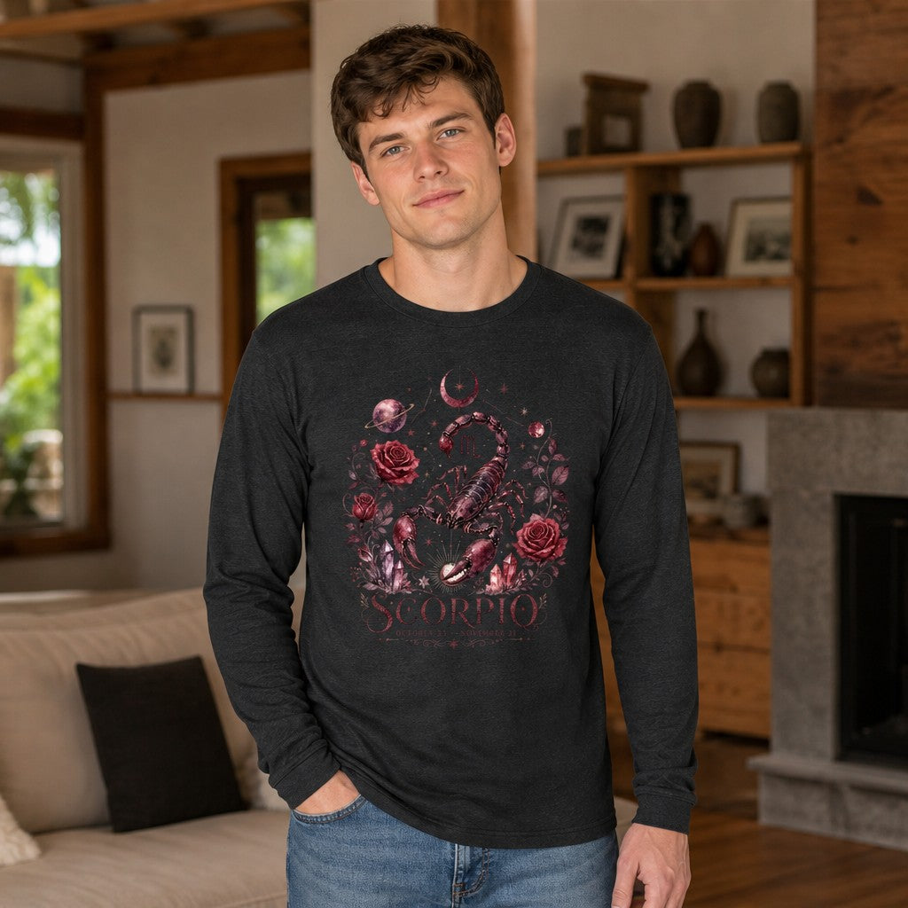 Man wearing a dark grey heather long sleeve Bella Canvas 3501 featuring a hand-painted Scorpio scorpion surrounded by deep red roses, amethyst crystals, crescent moons, and planetary motifs in a vintage botanical and celestial style, cozy living room scene, mystical astrology lovers cottagecore aesthetic, by Crossroads Dandelion