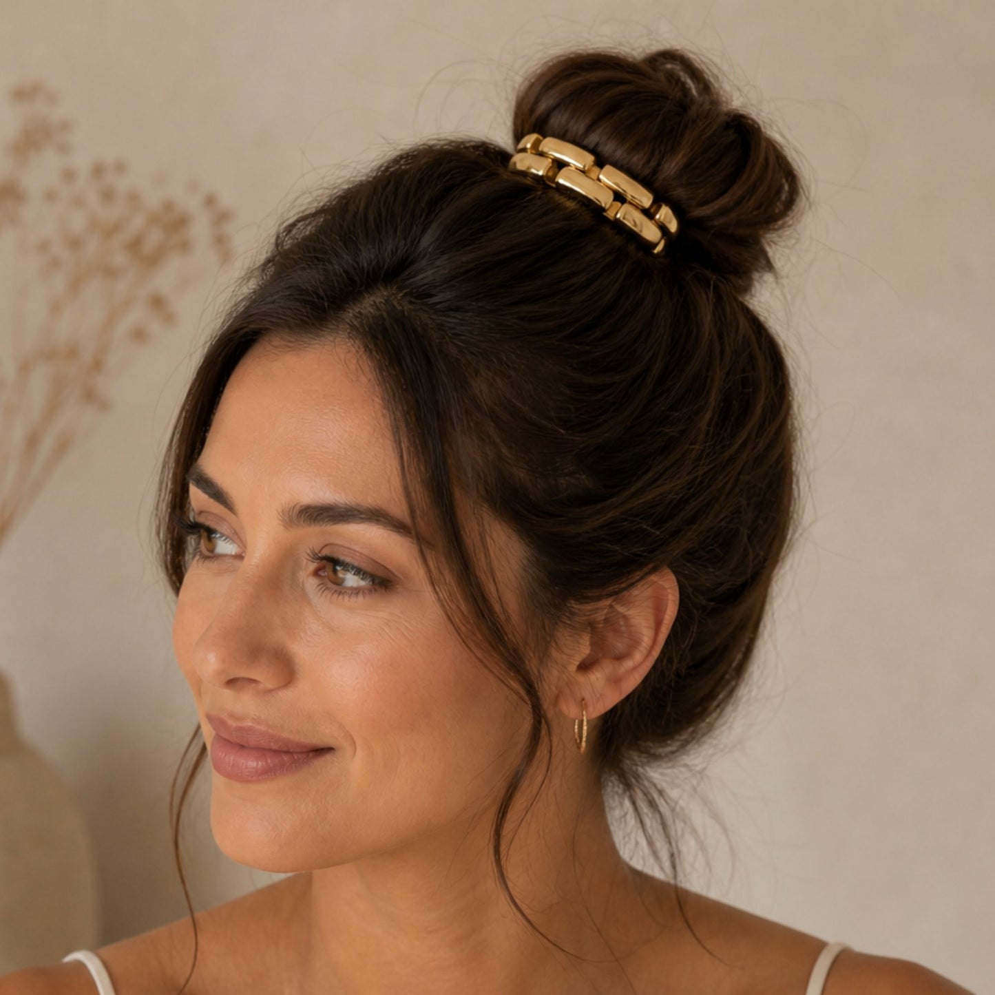 Woman in minimal natural setting wearing gold hair band, by Crossroads Dandelion