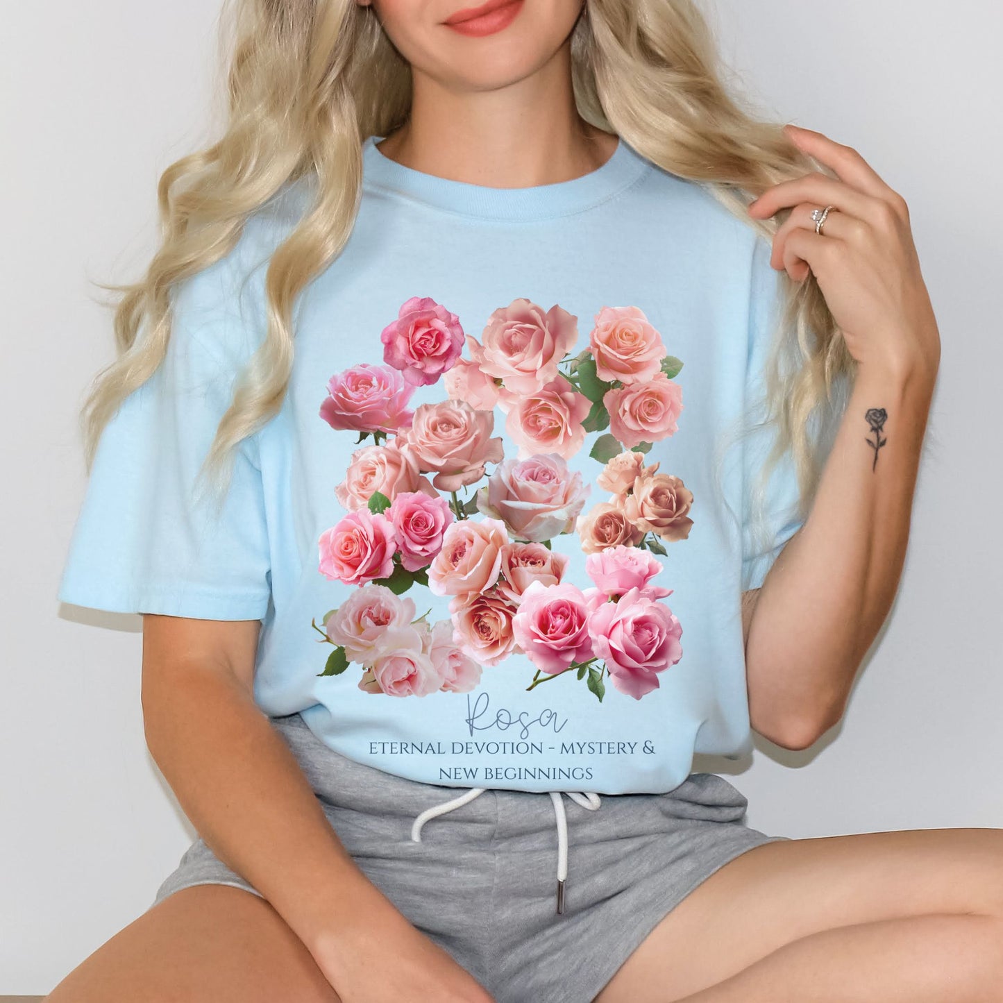 Woman wearing a Chambray color Rose floral June birthday gift shirt – Crossroads Dandelion