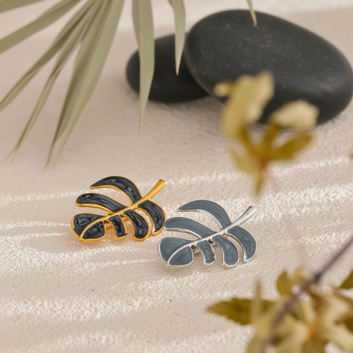 Leaf brooch product lifestyle display on neutral background, by Crossroads Dandelion