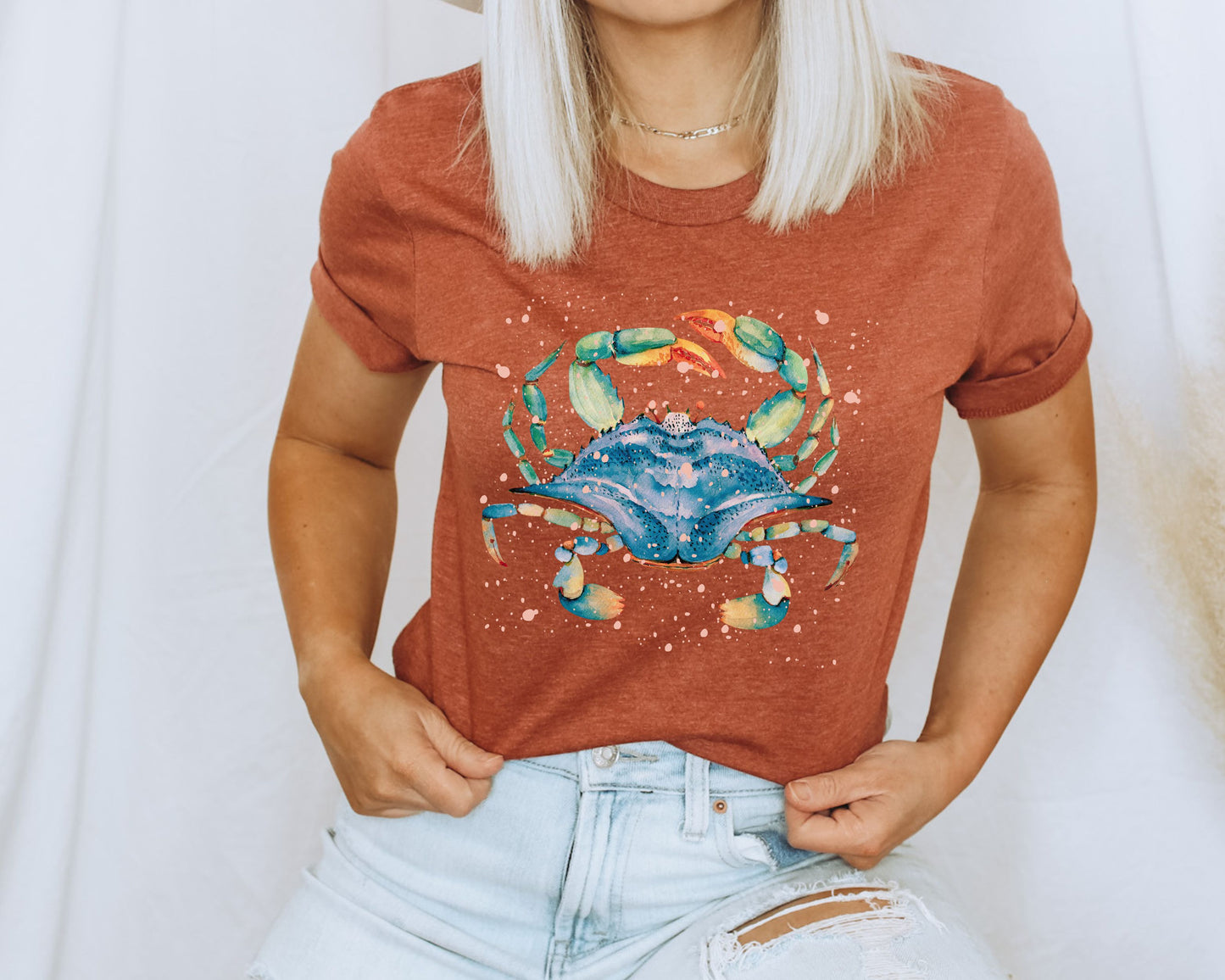Heather clayocean lover shirt featuring a woman wearing a watercolor blue crab artwork