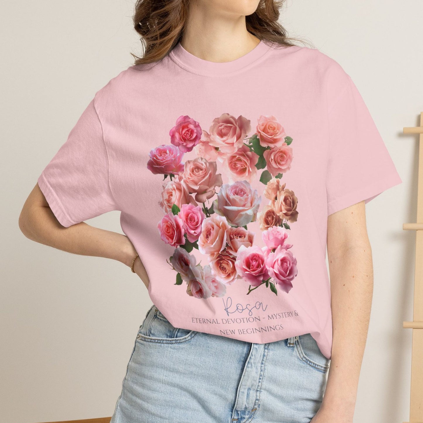 Woman wearing a Blossom pink cottagecore Rosa June birth flower tee with symbolic meaning – Crossroads Dandelion
