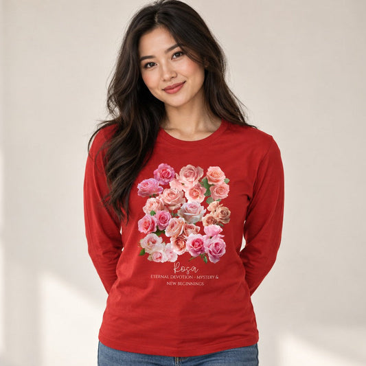 Woman wearing a red Bella Canvas 3501 long sleeve shirt featuring a vintage-inspired watercolor bouquet of pink and blush roses, romantic cottagecore floral design, perfect for garden and nature lovers, June birthday gift, by Crossroads Dandelion