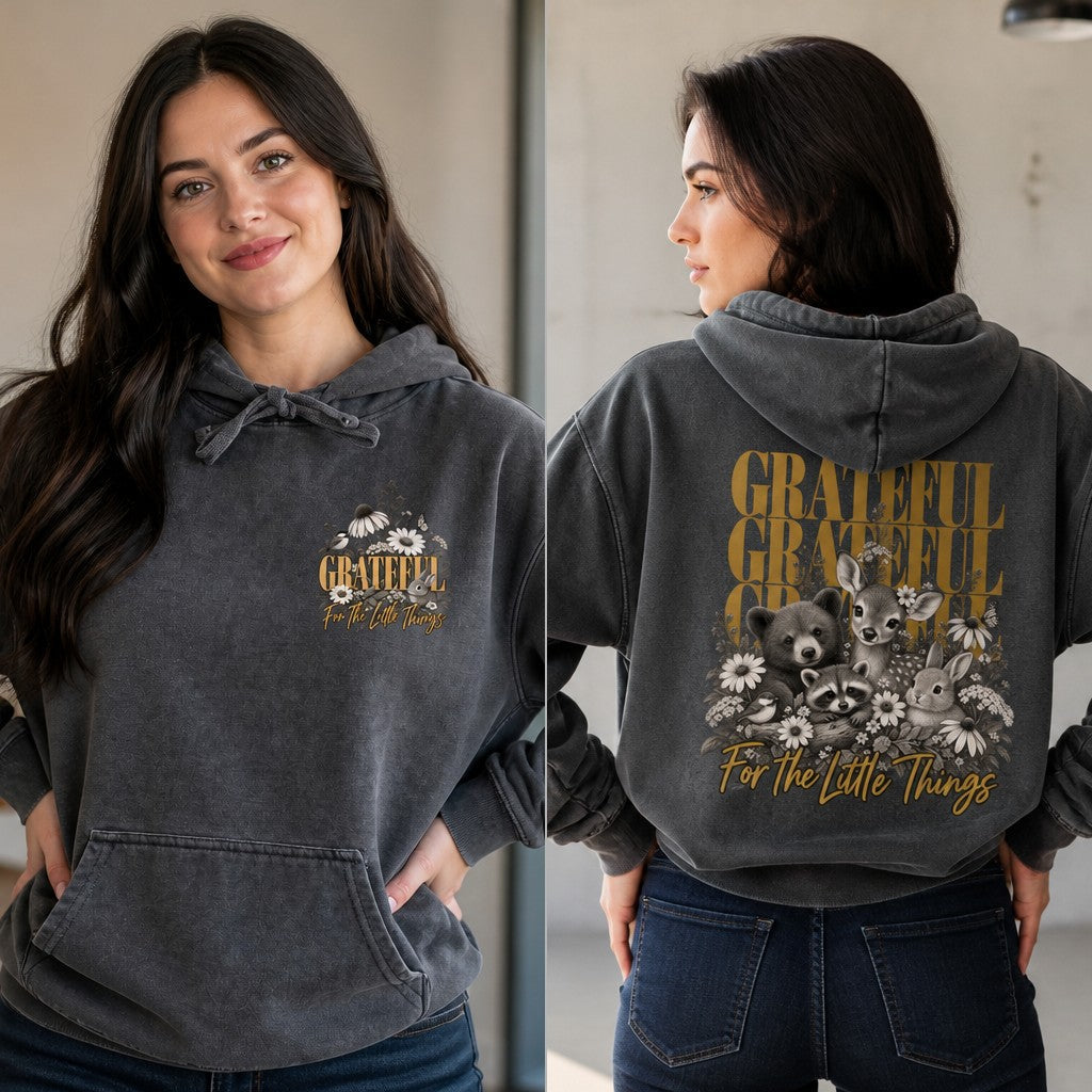 Woman wearing a pepper colored hoodie with a vintage-style 'Grateful For The Little Things' design featuring daisies and cute bears, cozy casual setting, women's loungewear, by Crossroads Dandelion