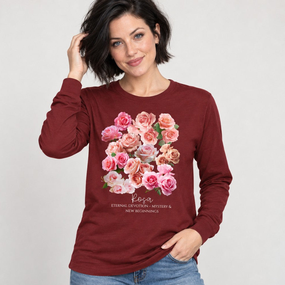 Woman wearing cardinal red Bella Canvas 3501 long sleeve featuring a vintage-inspired watercolor bouquet of pink and blush roses, romantic botanical design for floral lovers and nature enthusiasts, ideal for June birthdays, by Crossroads Dandelion