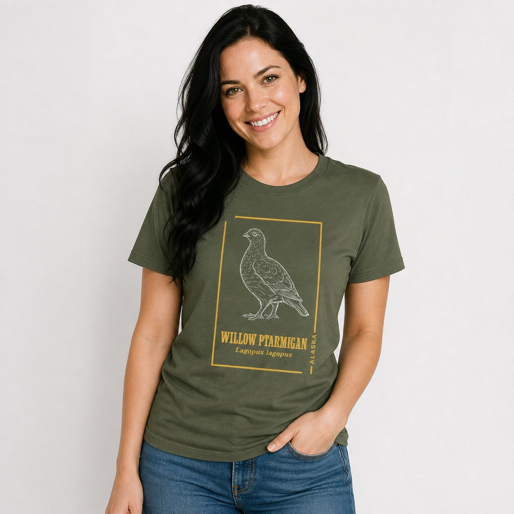 Woman wearing military green Bella Canvas 3001 t-shirt featuring a vintage hand-drawn willow ptarmigan illustration with golden botanical accents, cottagecore naturalist style, ideal for birdwatchers and wildlife lovers, by Crossroads Dandelion