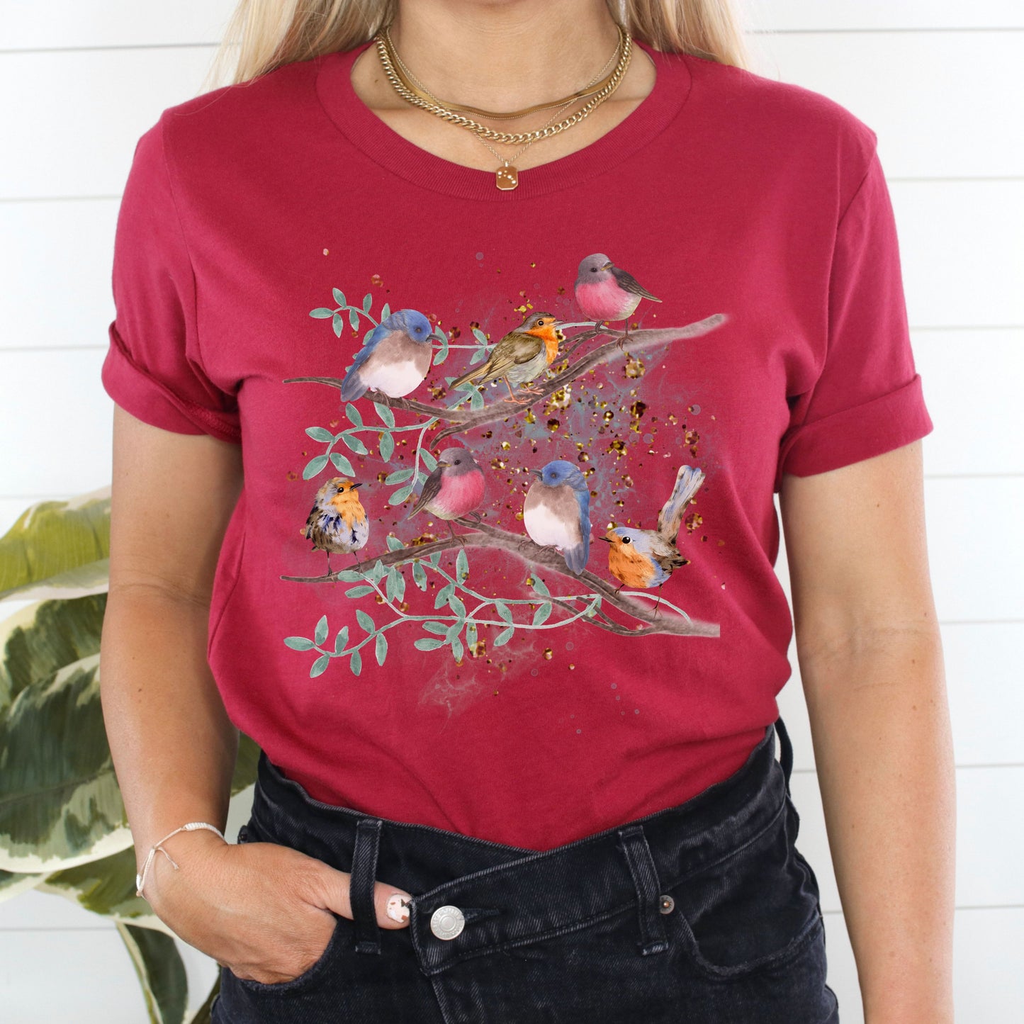 Cardinal red bird lover graphic tee with delicate floral branch design